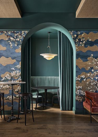 hotel vesper houston texas parisian feminine design restaurant blue archway nook seating